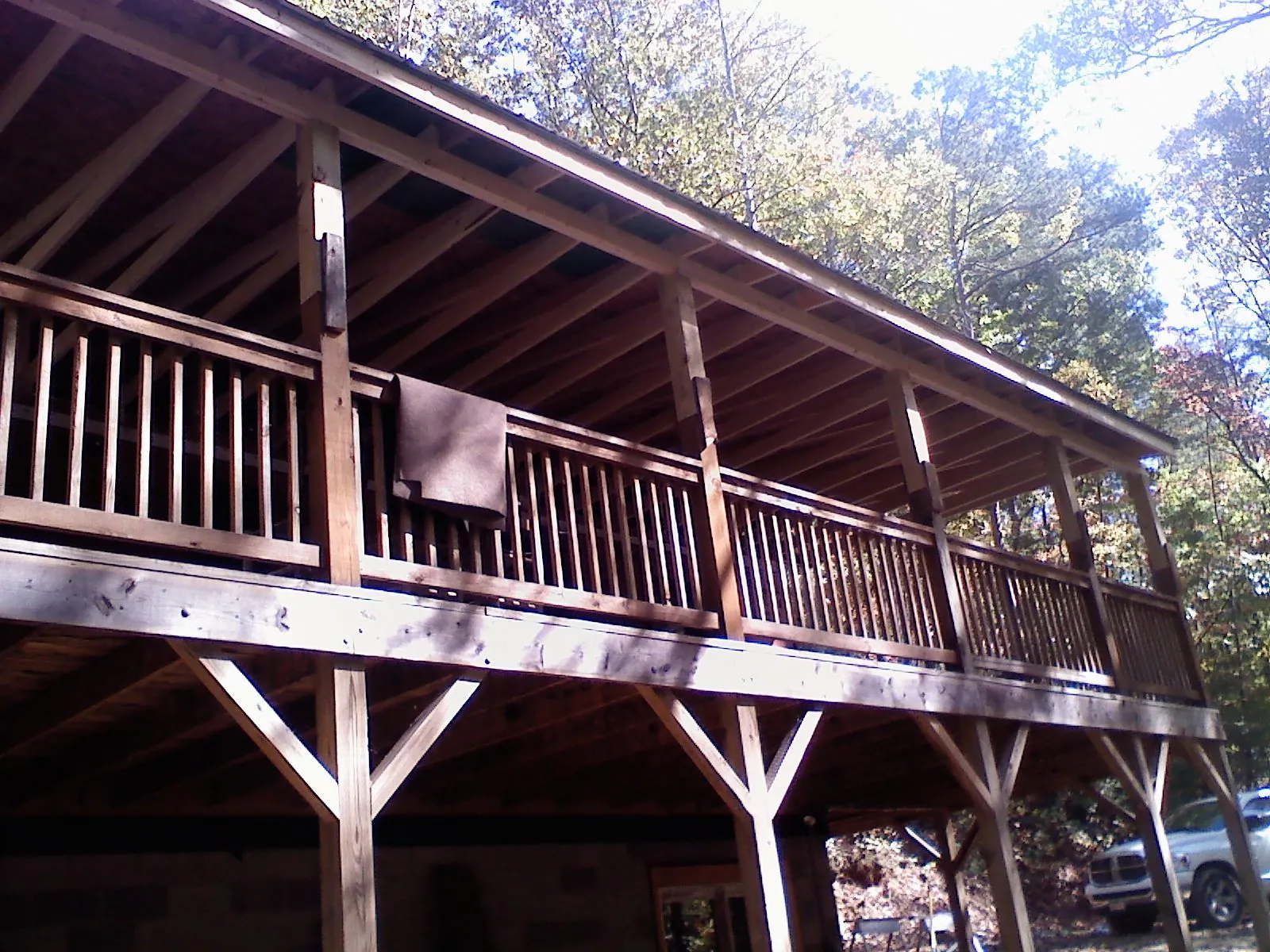 Timber framing under a new elevated porch and deck — Roof Leak Repair in Yachats by Roofing Brothers